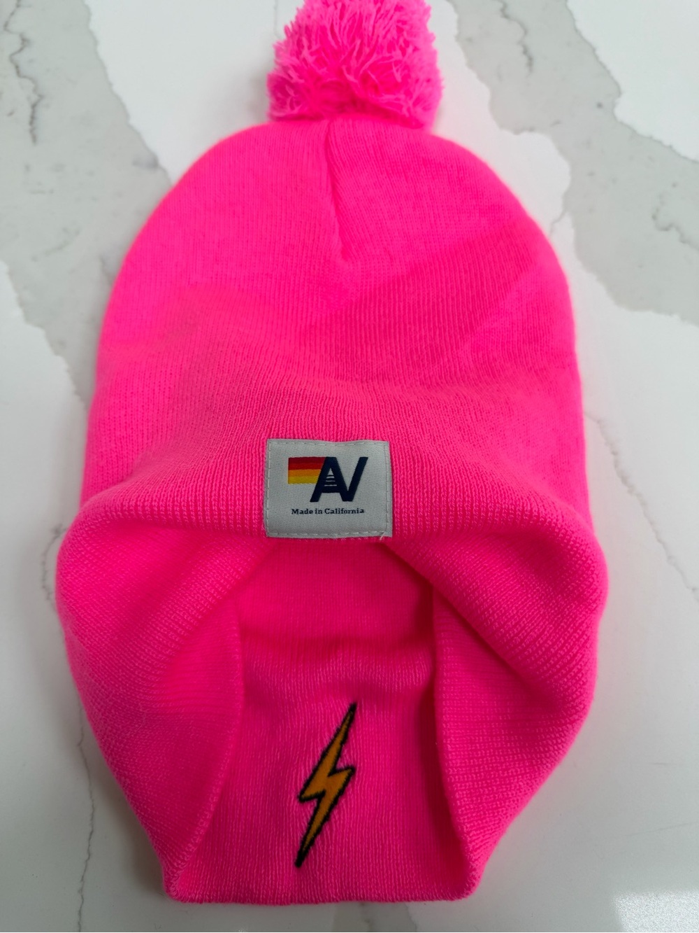 Aviator Nation Neon Pink Pom Beanie with Lightning Patch